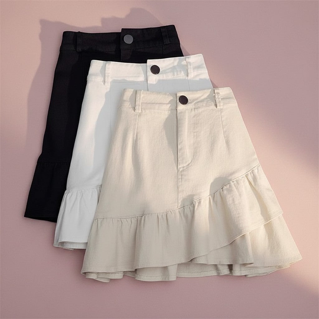 Jelly Studio black, white, and cream denim baby doll mini skorts with ruffled hem detail.