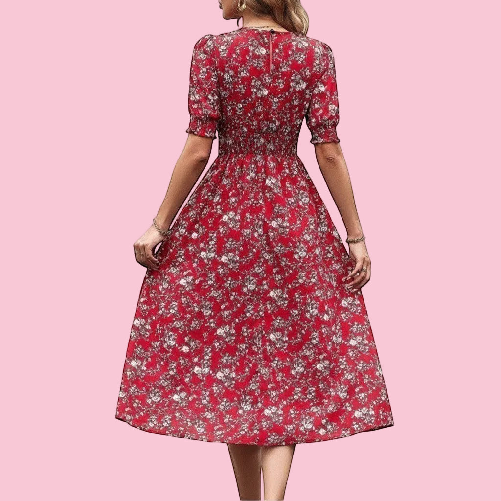 Jelly Studio red floral print midi tea dress with smocked bodice, puff sleeves, and tiered skirt.